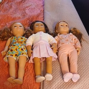 Charming Trio of Dolls with Colorful Outfits